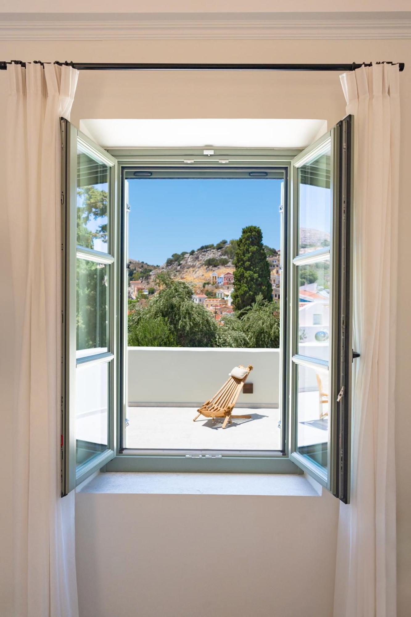 Nisomar Suites Sými Luaran gambar