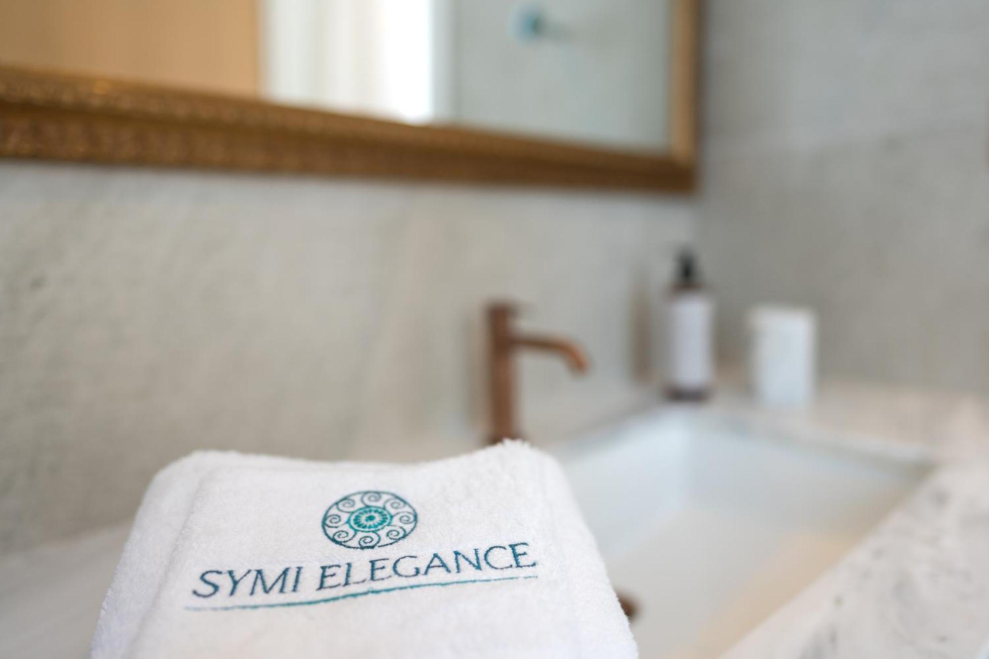Nisomar Suites Sými Luaran gambar
