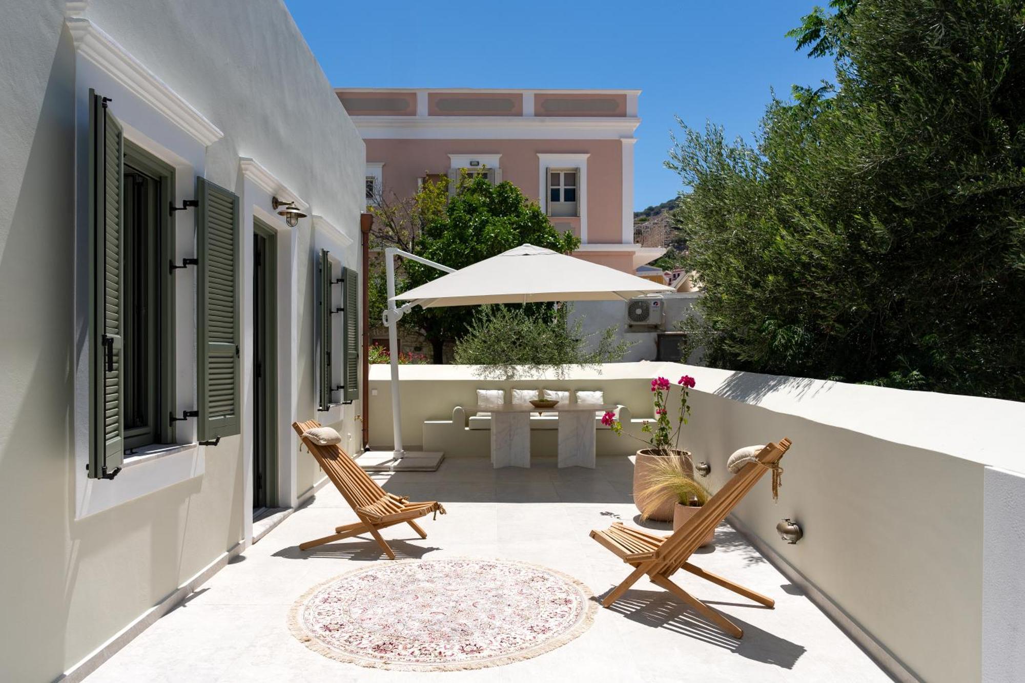 Nisomar Suites Sými Luaran gambar