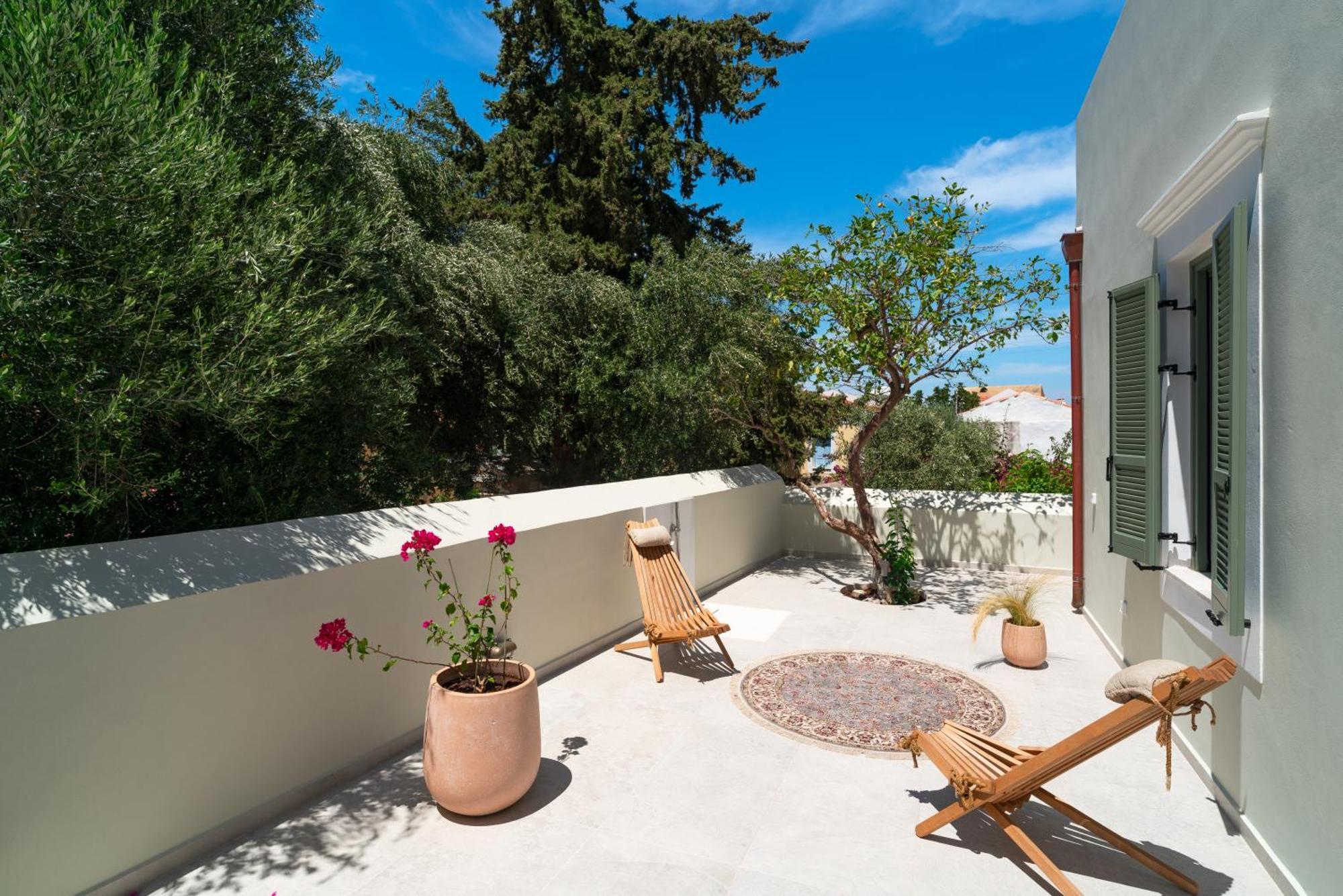 Nisomar Suites Sými Luaran gambar