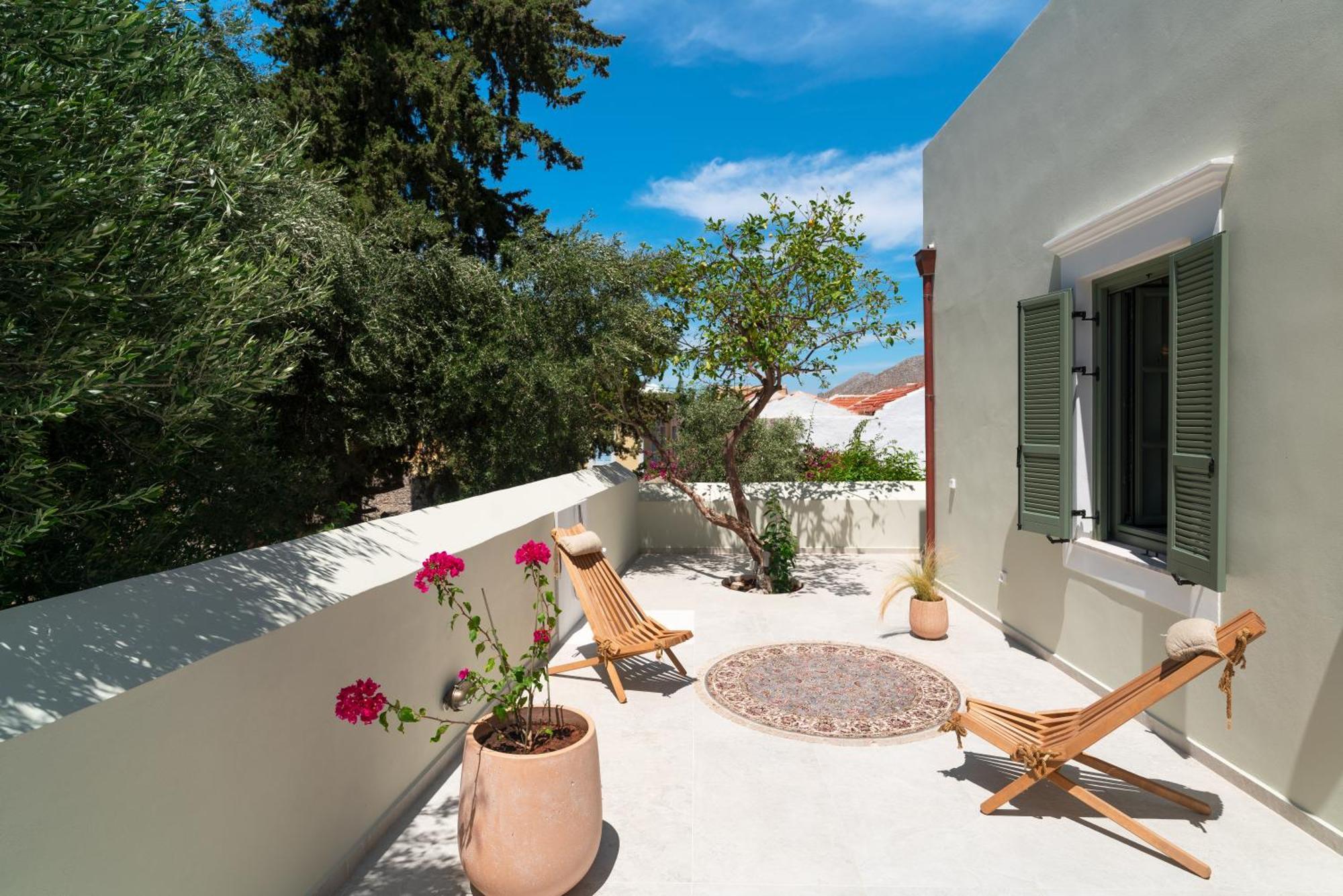 Nisomar Suites Sými Luaran gambar