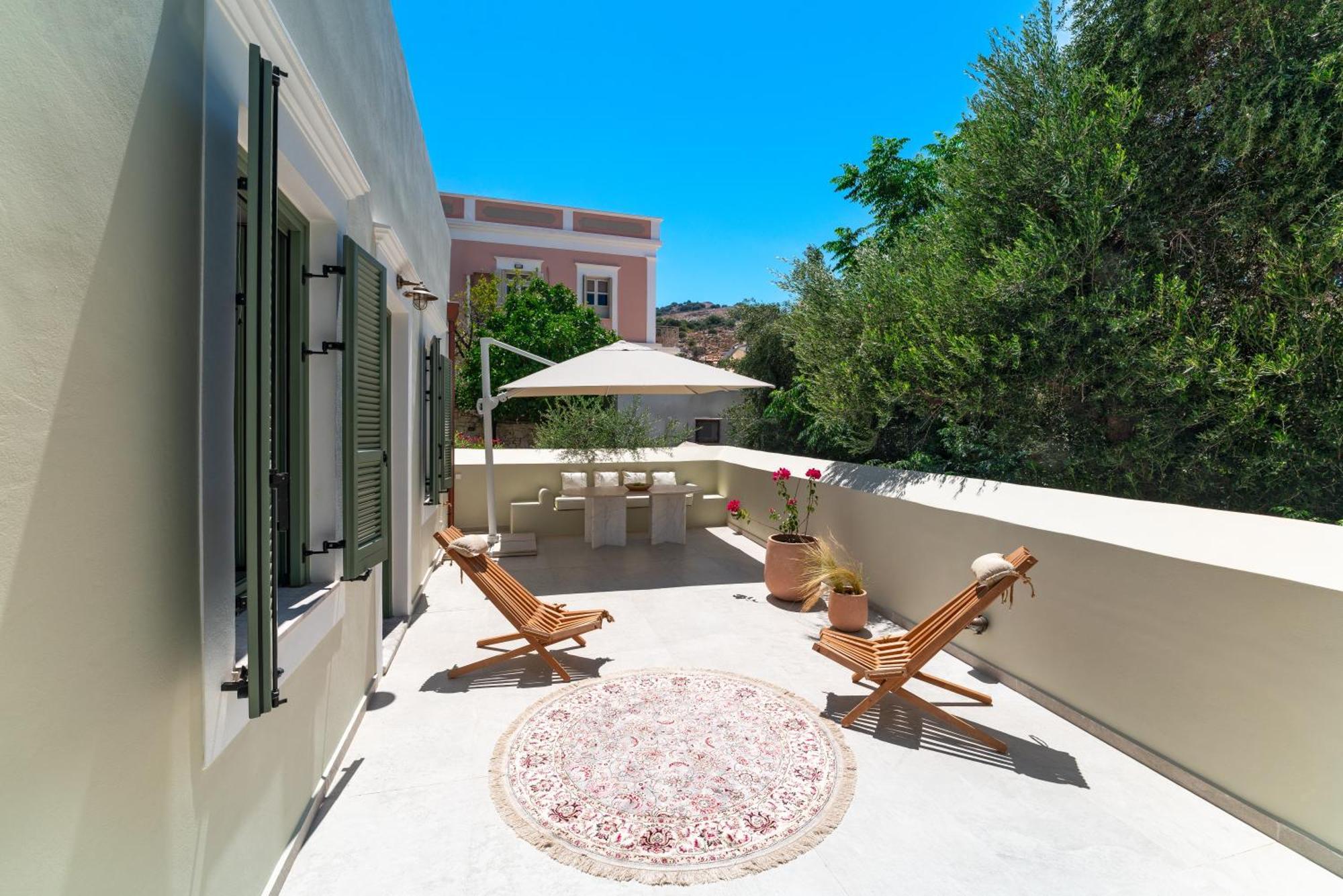 Nisomar Suites Sými Luaran gambar